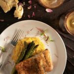 A filet of tender, flaky salmon over creamy saffron risotto.