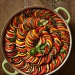 Colorful spiral ratatouille sits proudly in a bowl