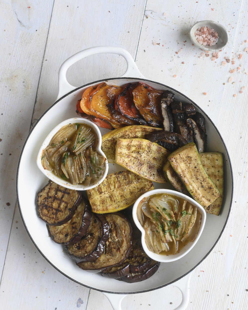 Roasted Veggies grilled to perfection with herbs, served on a bowl.