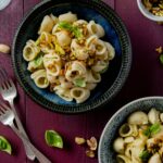 a bowl of tortellini pasta with Zucchini Pasta Sauce