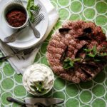 An aerial view of Chocolate Mint Pie with a side of whipped mint cream. Chocolate Mint Pie Recipe