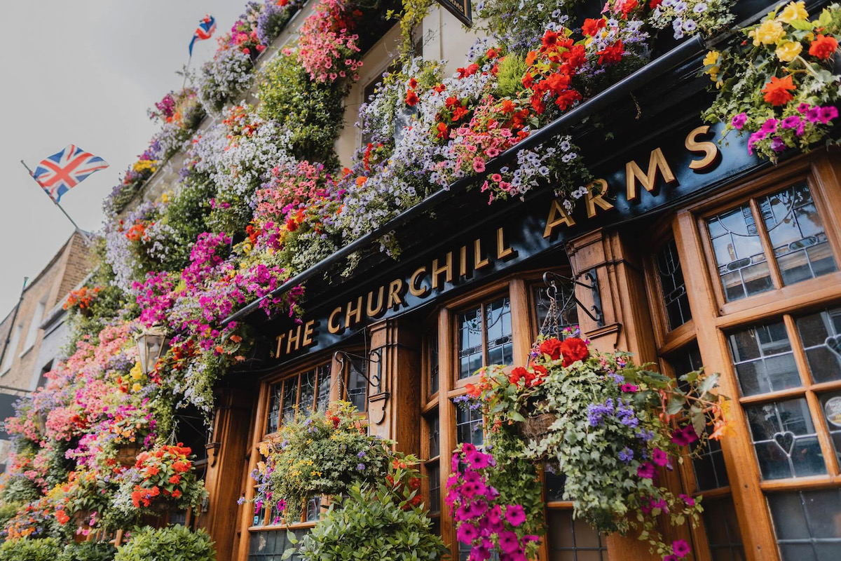 The flowery outside of Churchill Arms pub in London