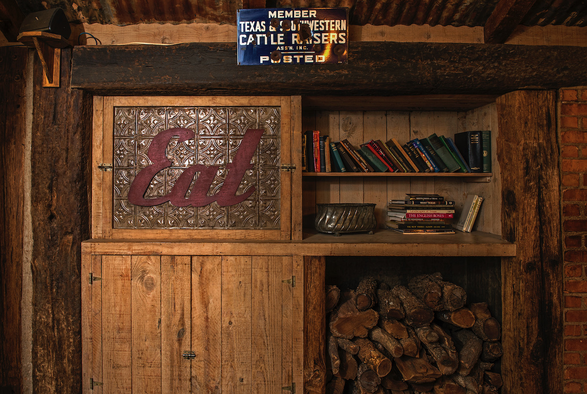 A rustic series of cabinets on a wall 