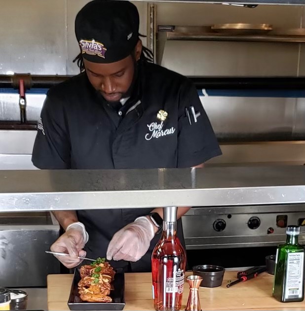 Chef Marcus Woods at work in his kitchen at Sylvia's 