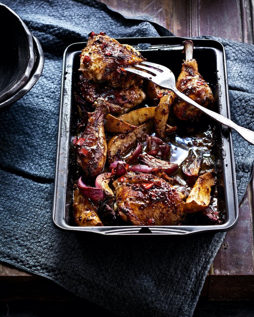 Chicken in Mustard and Appelstroop served in a skillet with a fork