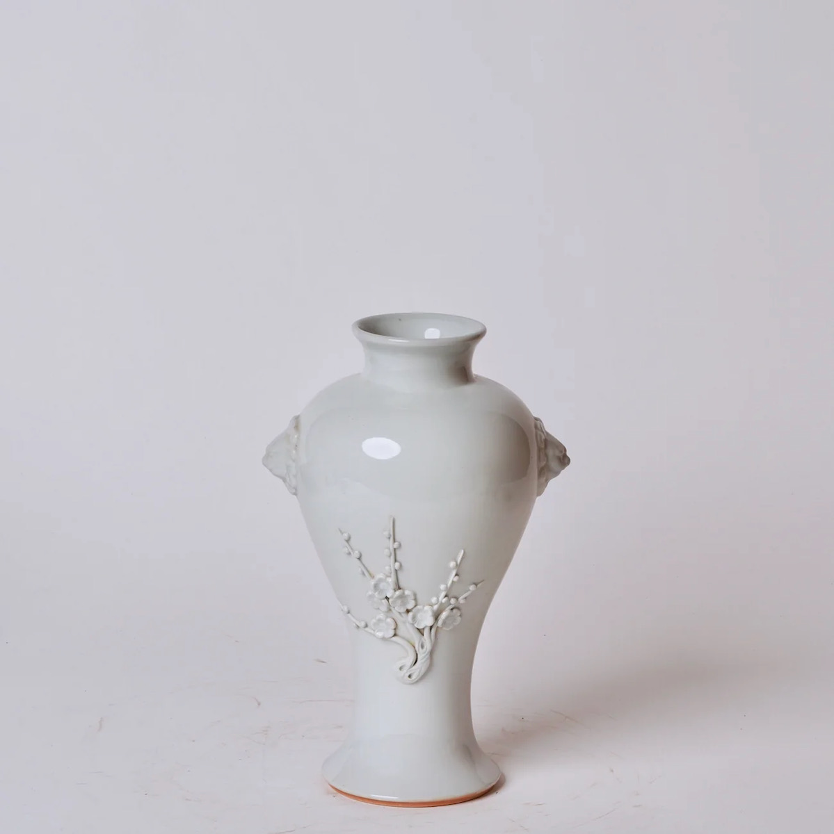 A white Jingdezhen porcelain vase on a white background