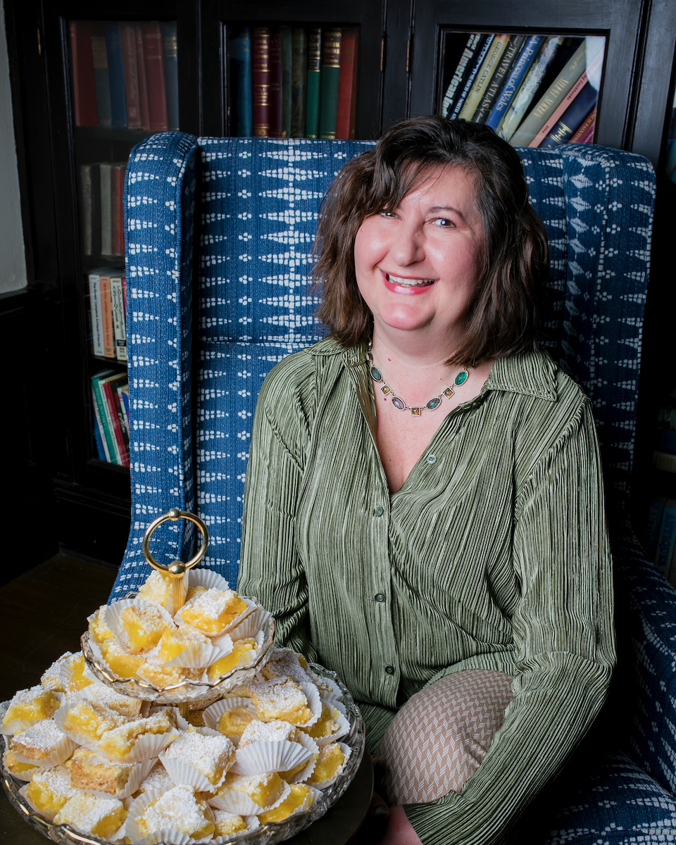 Gretchen Jenkins, a baker, holds a plate of lemon curd bars