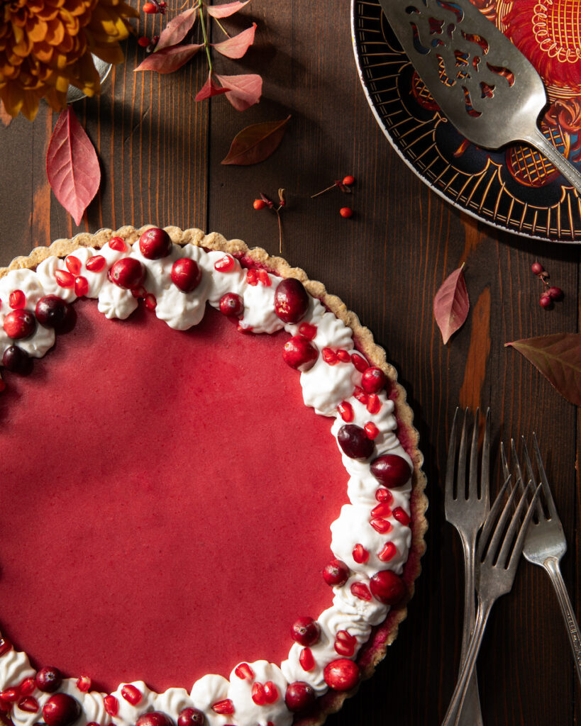 A cranberry tart garnished for fall