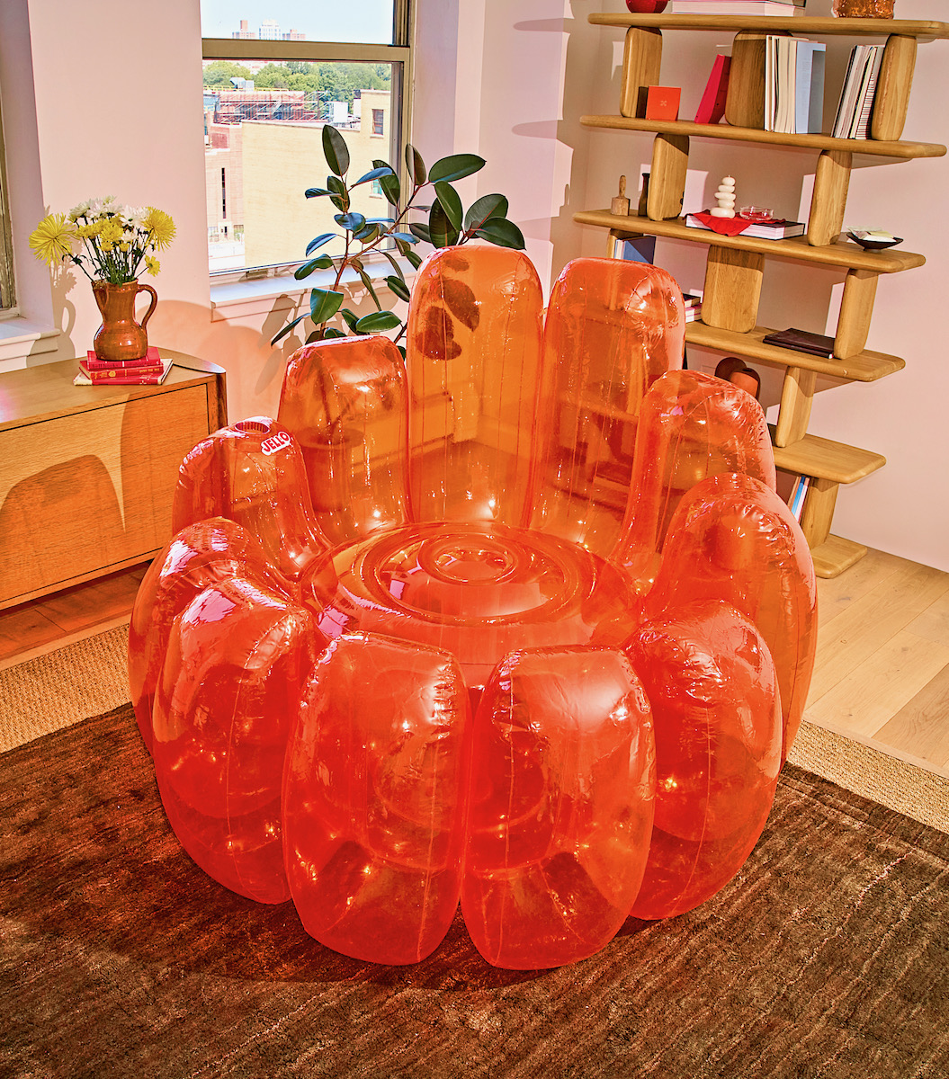 An orange chair shaped like a JELL-O mold