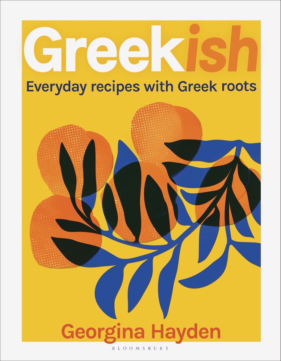 The cover of Greekish, an orange graphic with a dark blue leaf on it 