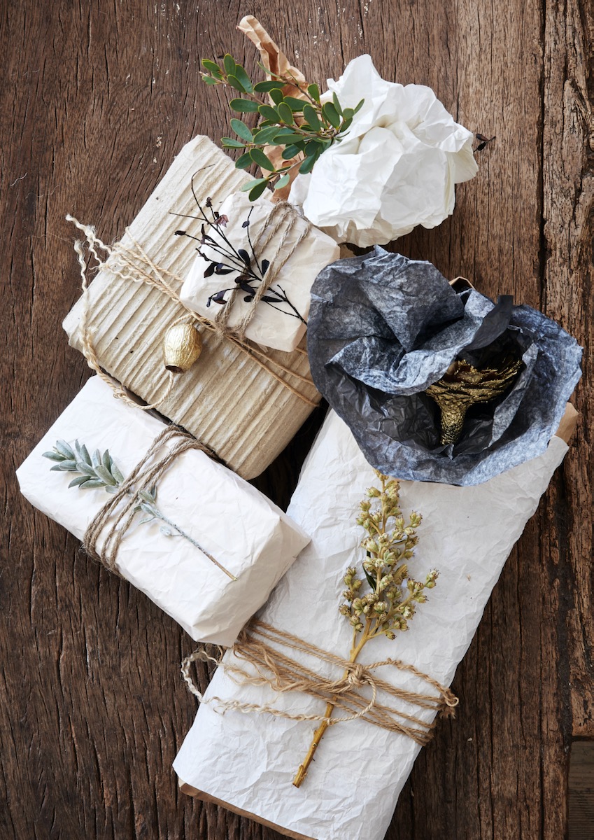 A parcel of twine-bound packages with small, delicate details for the holidays