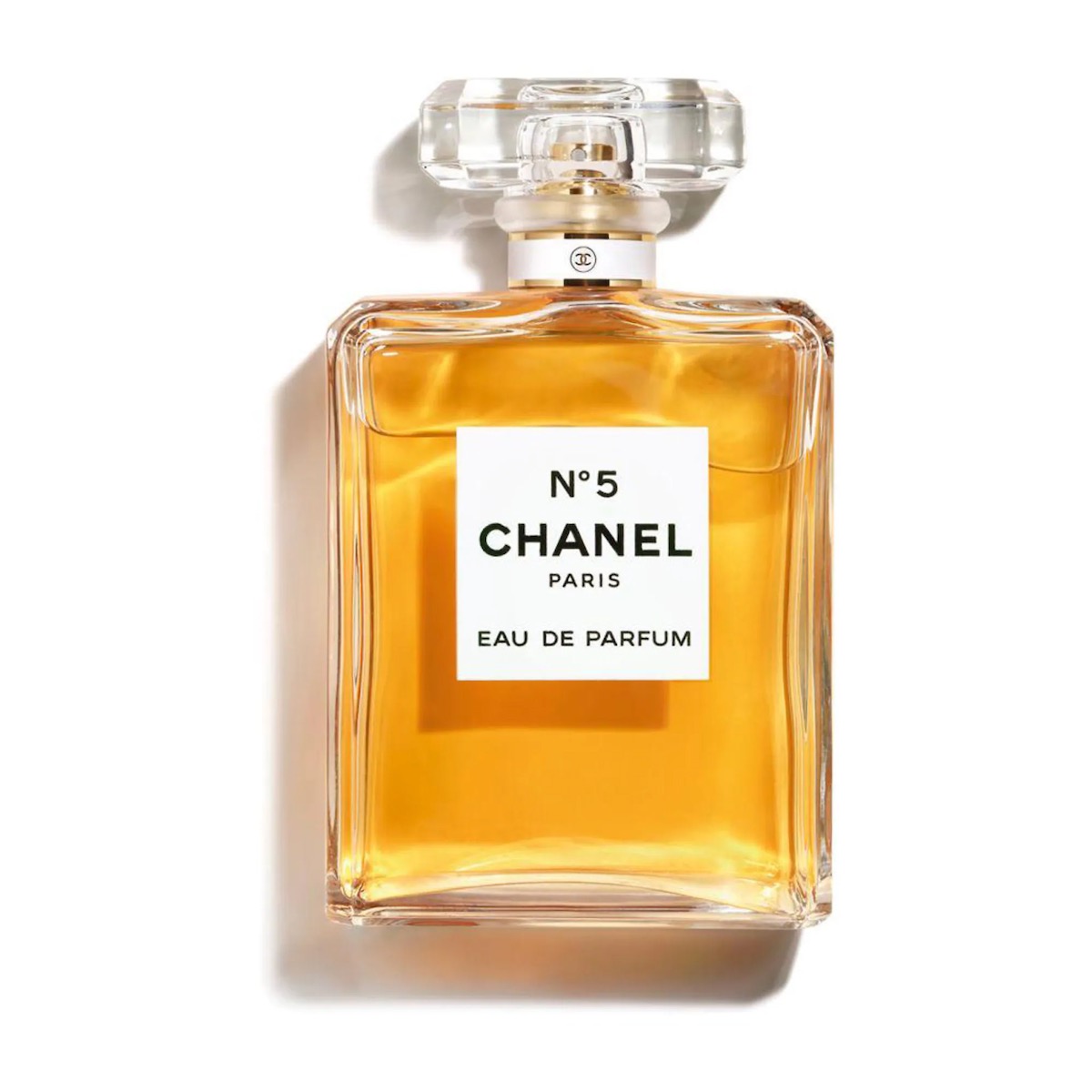 An orange bottle of the classic fragrance Chanel NO. 5 