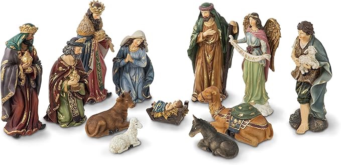 Nativity scene figures colored with a more traditional style, dressed in classic garb on a white background